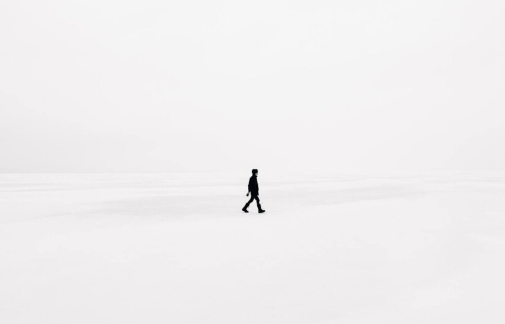 single person walking in a snow storm